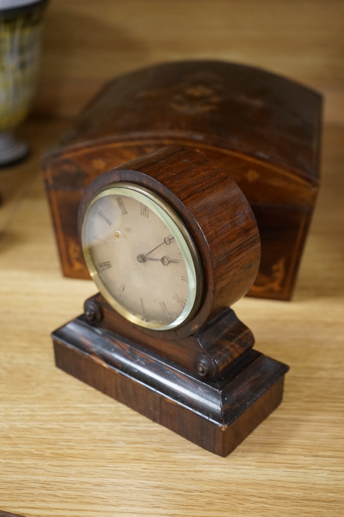 A 19th century rosewood and inlaid silk lined box, a small VAP timepiece and a carved page turner, largest 22cm wide